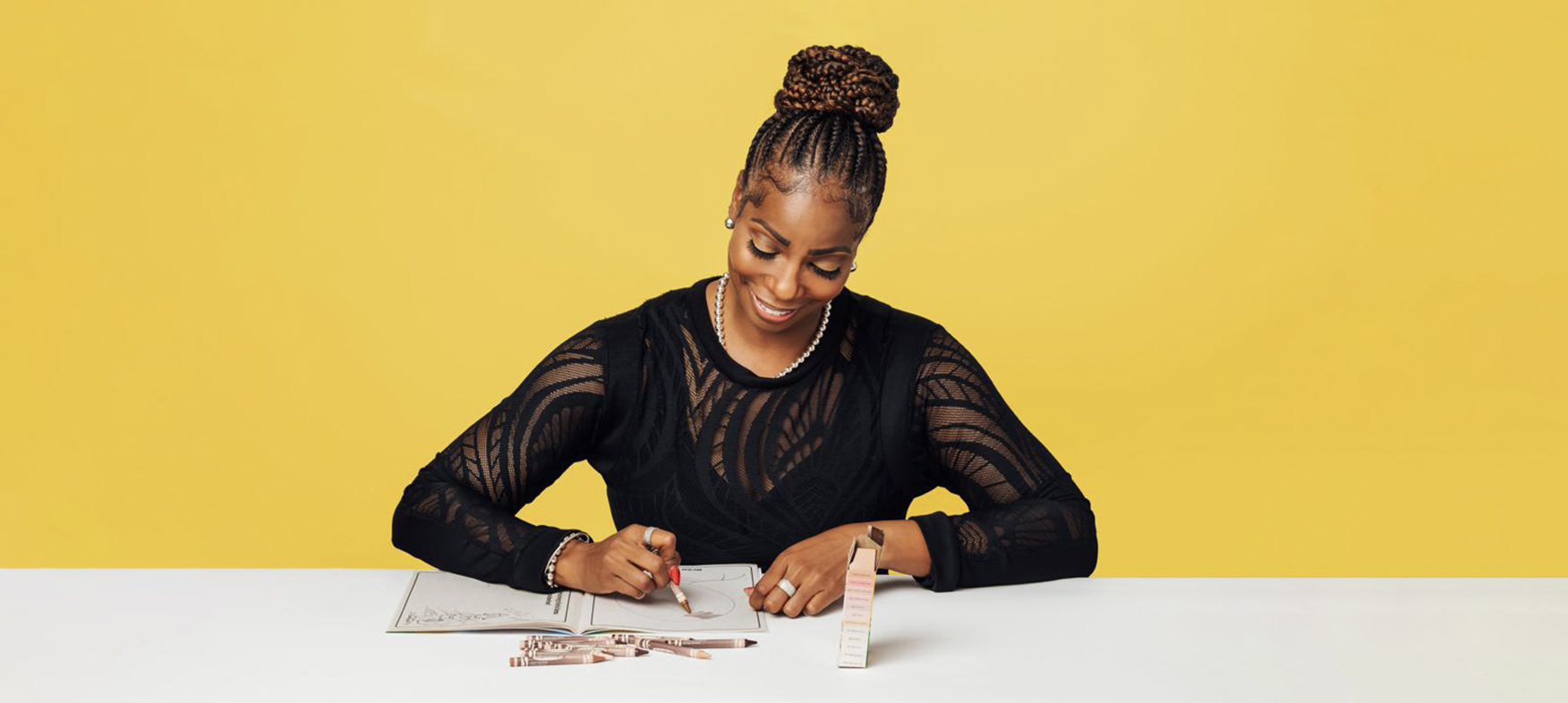 woman using crayola colors of the world crayons