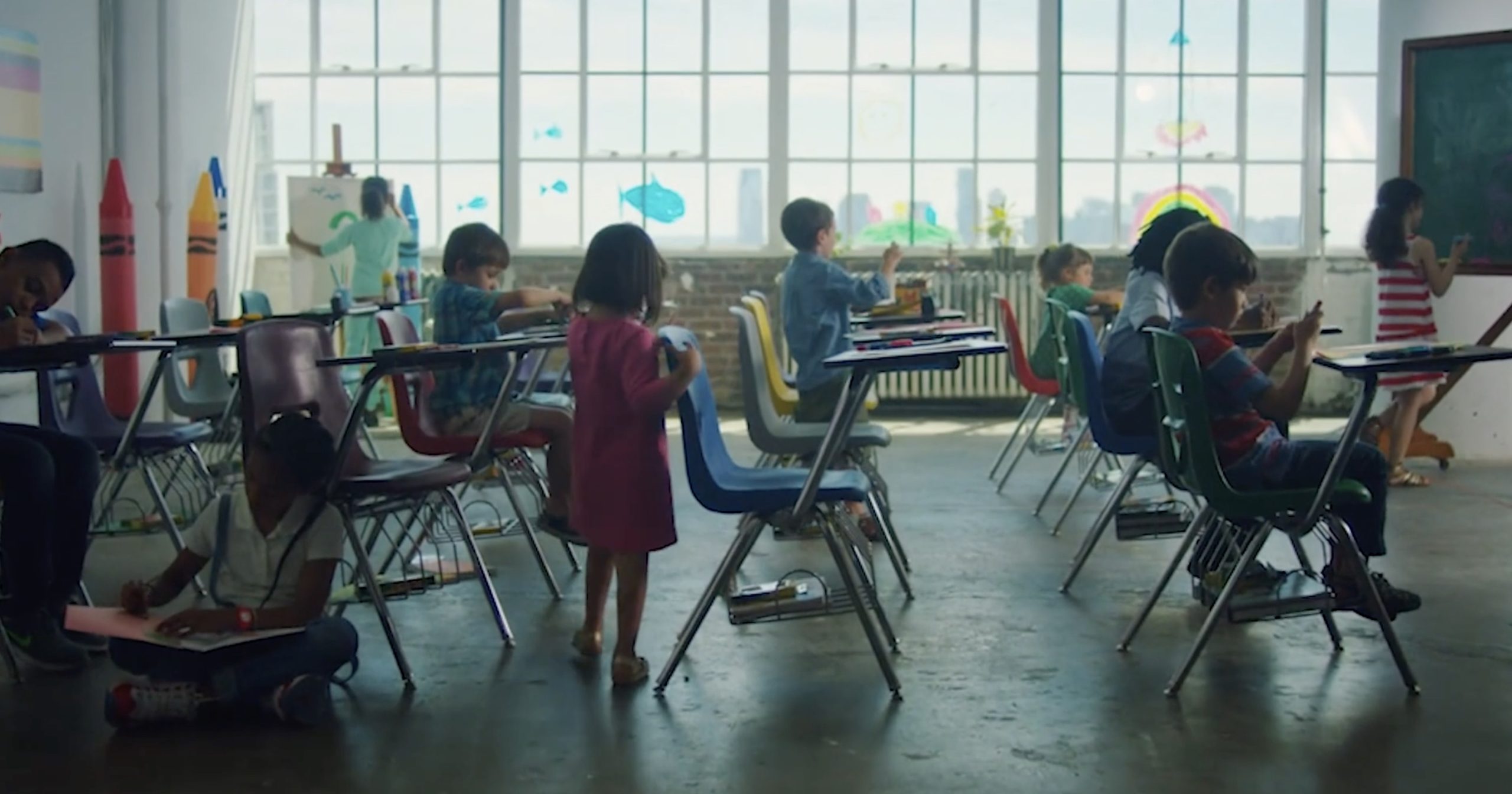 kids sitting in a classroom learning